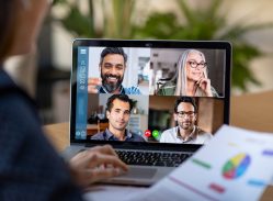 Four co-workers on a video chat business call